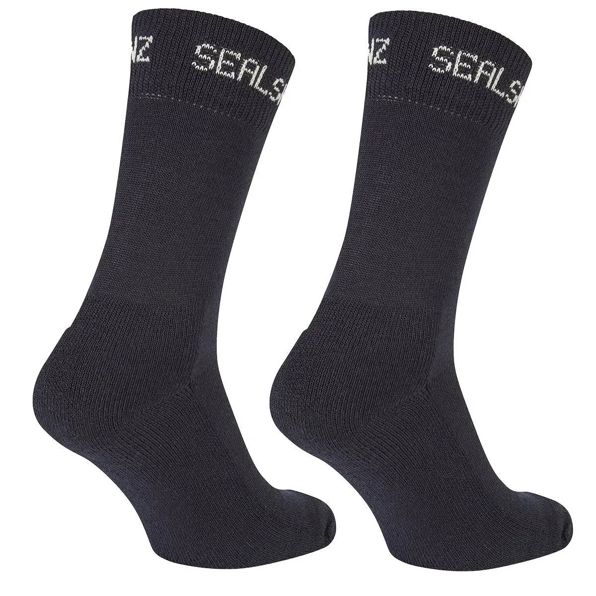Side view of SealSkinz Suffield Solo Merino Liner Sock in black, highlighting its ergonomic design. Provides warmth and breathability for all-day wear.