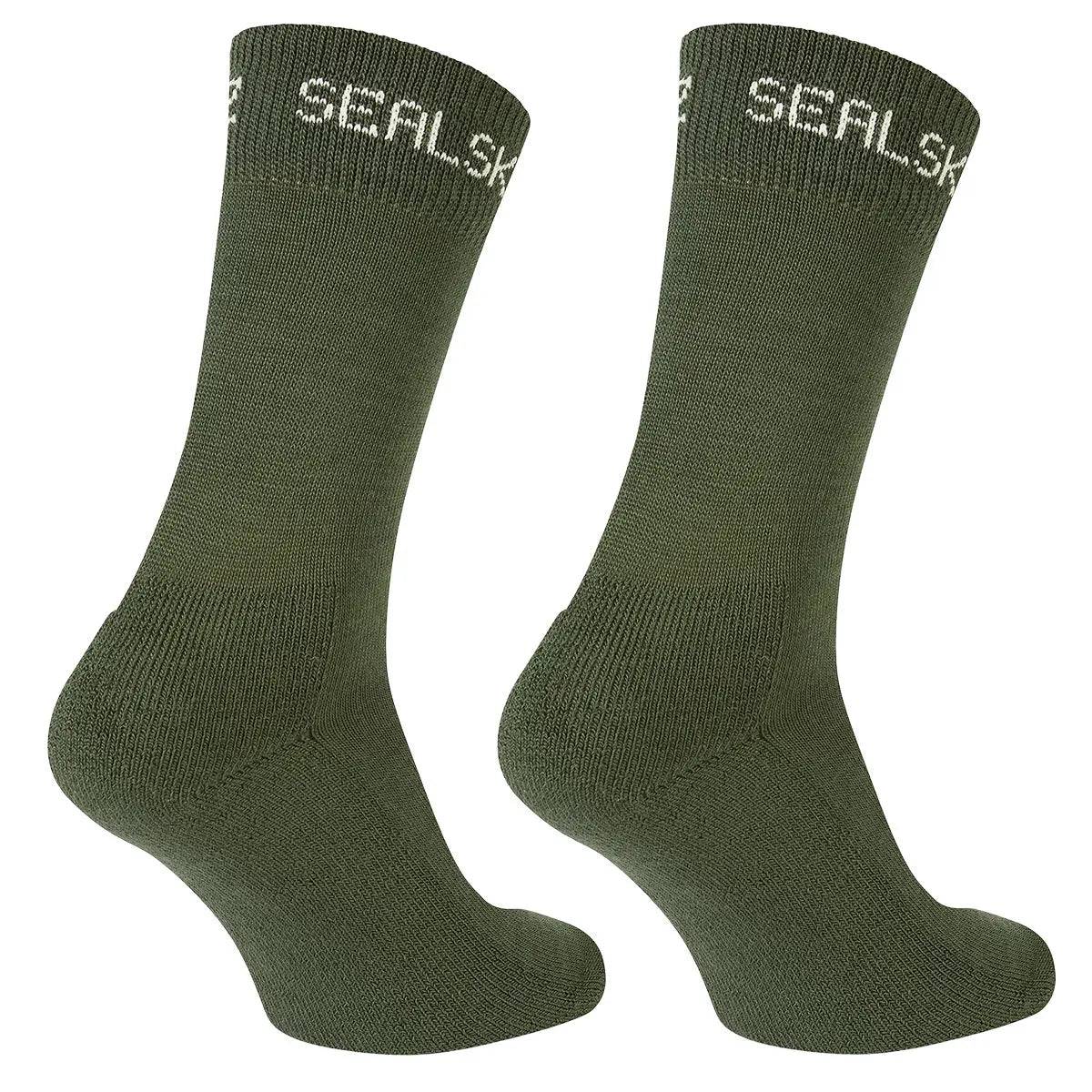 Side view of SealSkinz Suffield Solo Merino Liner Sock in olive green, showcasing its snug fit. Designed for comfort and moisture-wicking performance.