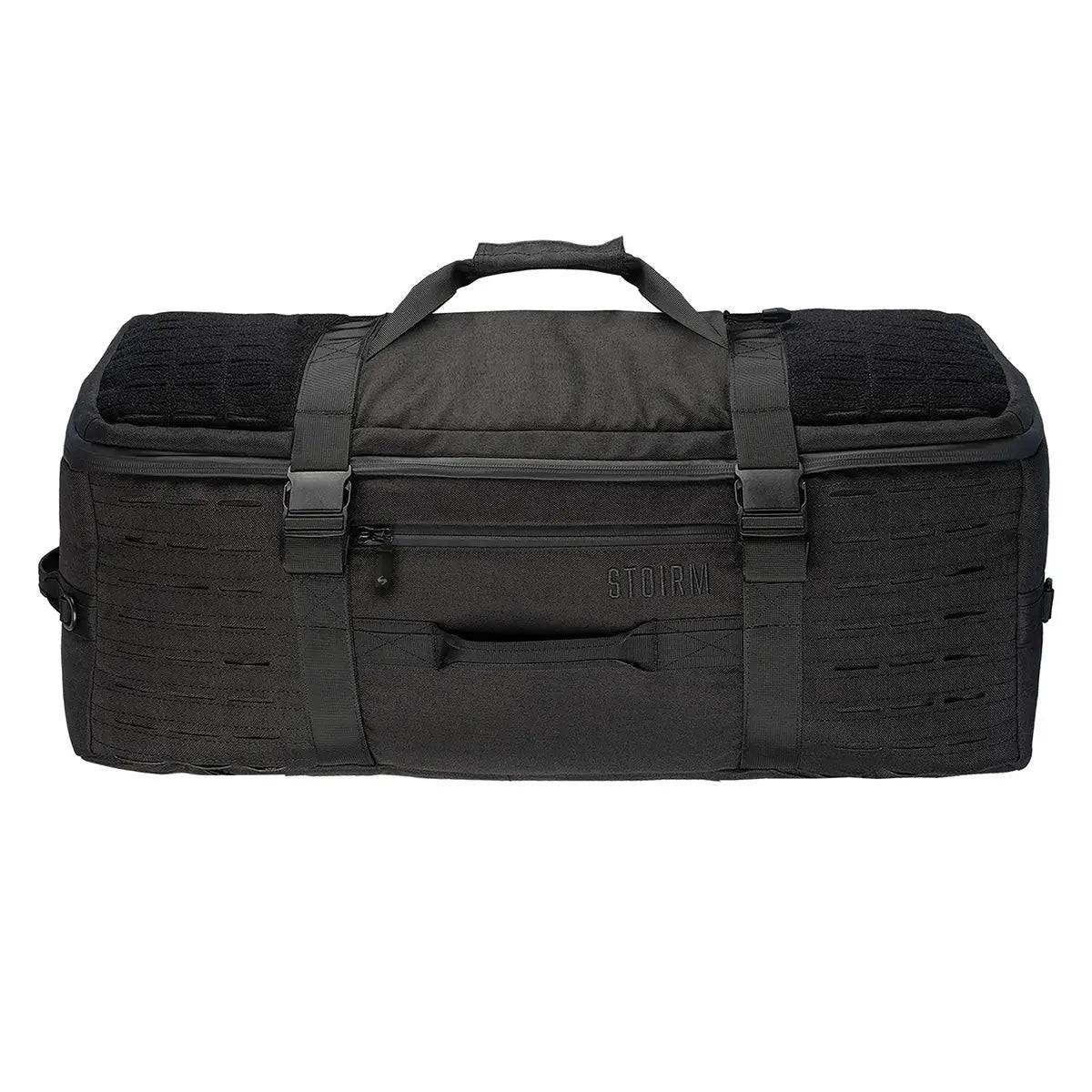 Stoirm 50L Black Duffel Bag laid flat with reinforced handles, compression straps, and front zippered pocket for secure storage.