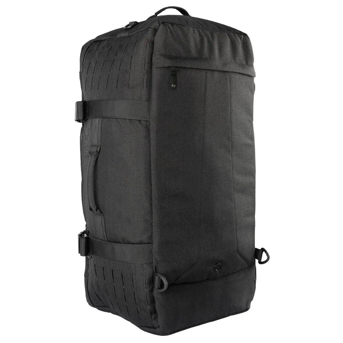 Stoirm 50L Black Duffel Bag standing upright, showing a durable back panel with reinforced stitching and multiple handles.