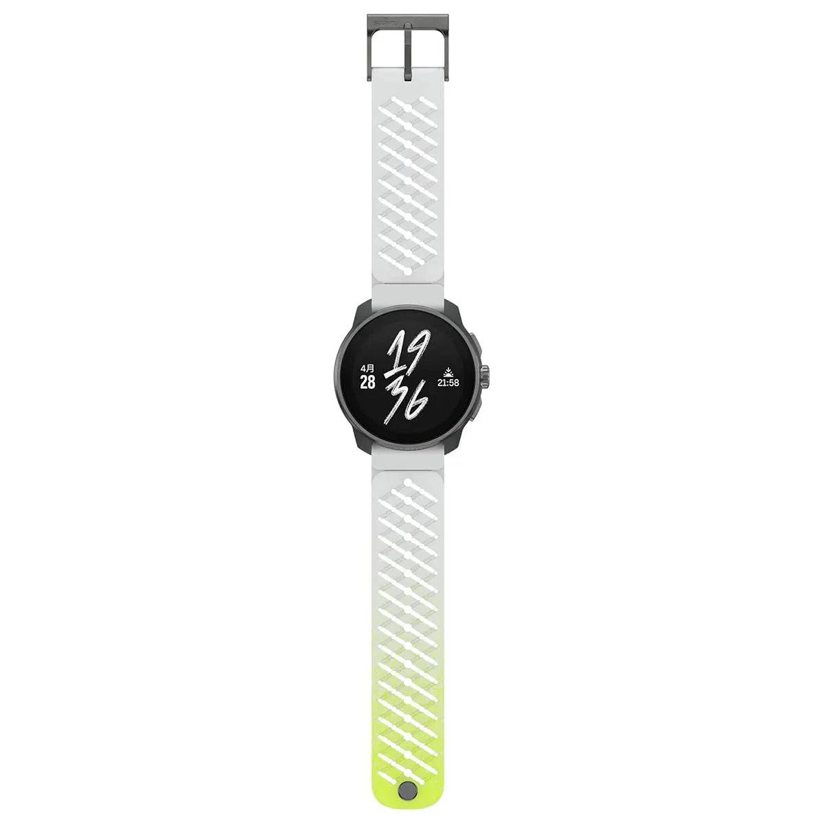 Suunto Race S Titanium GPS Smartwatch laid flat, showcasing its full-length perforated white-to-green gradient silicone strap and modern digital display