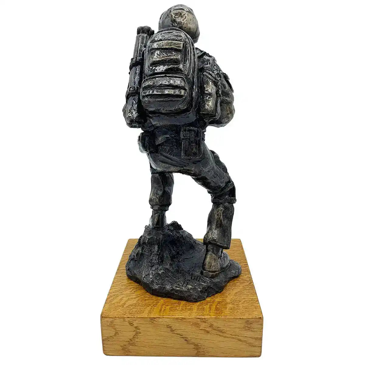 Rear view of Afghan Medic Bronze Resin Statue highlighting backpack and tactical details, perfect for military-themed sculpture collections. from John Bull Clothing