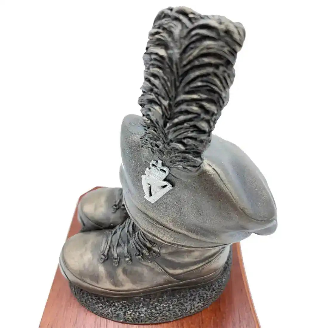 Close-up of Caubeen and Boots Bronze Resin Statue with Irish military insignia and feather detail, perfect for collectors. from John Bull Clothing
