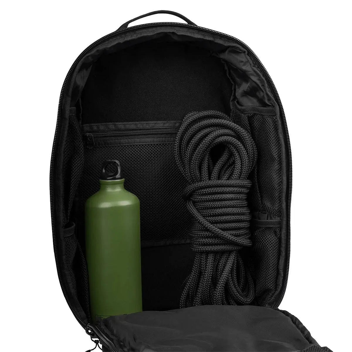 Spacious main compartment of Highlander Harrier 25L Clamshell Rucksack in black, storing a water bottle and rope, ideal for outdoor expeditions.
