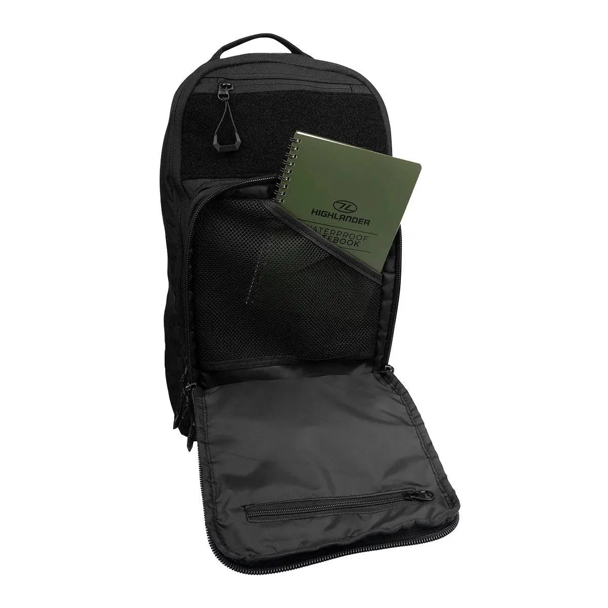 Interior view of Highlander Harrier 25L Clamshell Rucksack in black, featuring a mesh pocket and waterproof notebook storage for organization.