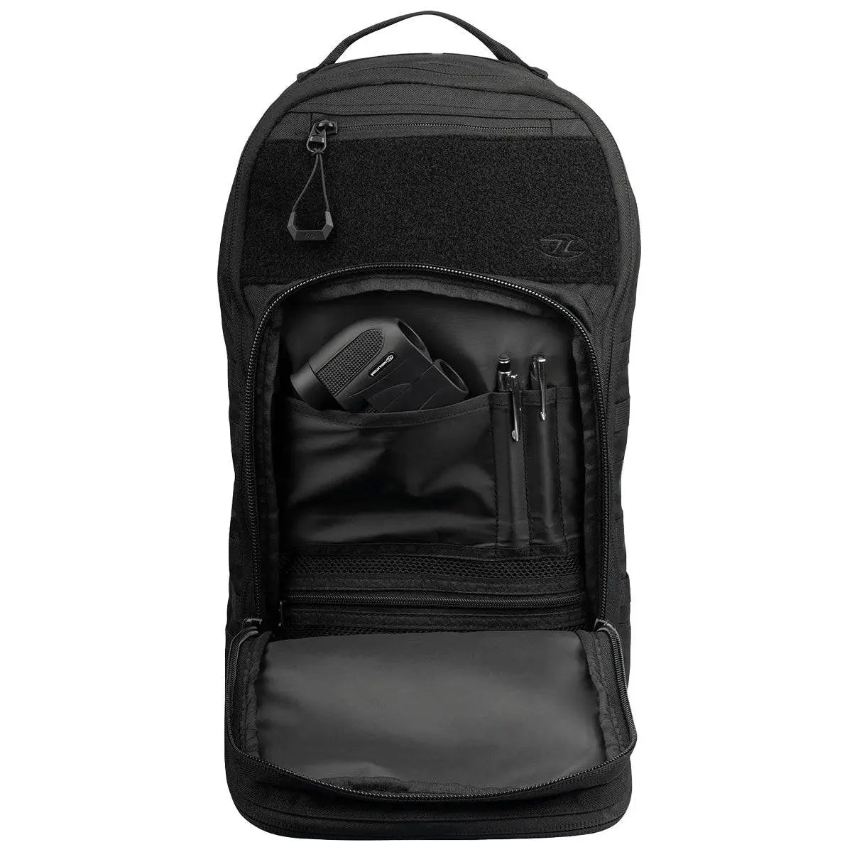 Front compartment of Highlander Harrier 25L Clamshell Rucksack in black, displaying organized storage for essentials like gadgets and stationery.