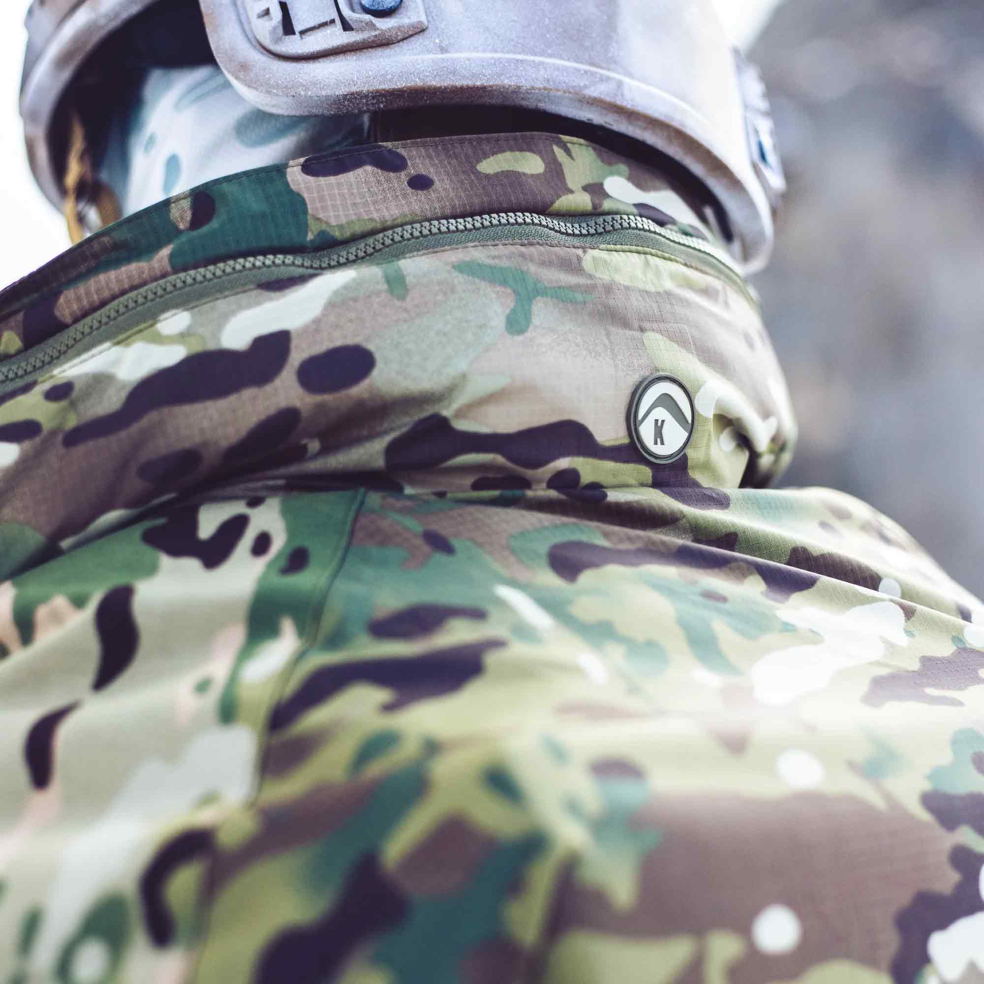 Close-up of the Keela Mk5 Waterproof Jacket MTC collar, highlighting the waterproof fabric and Keela logo for premium outdoor performance.