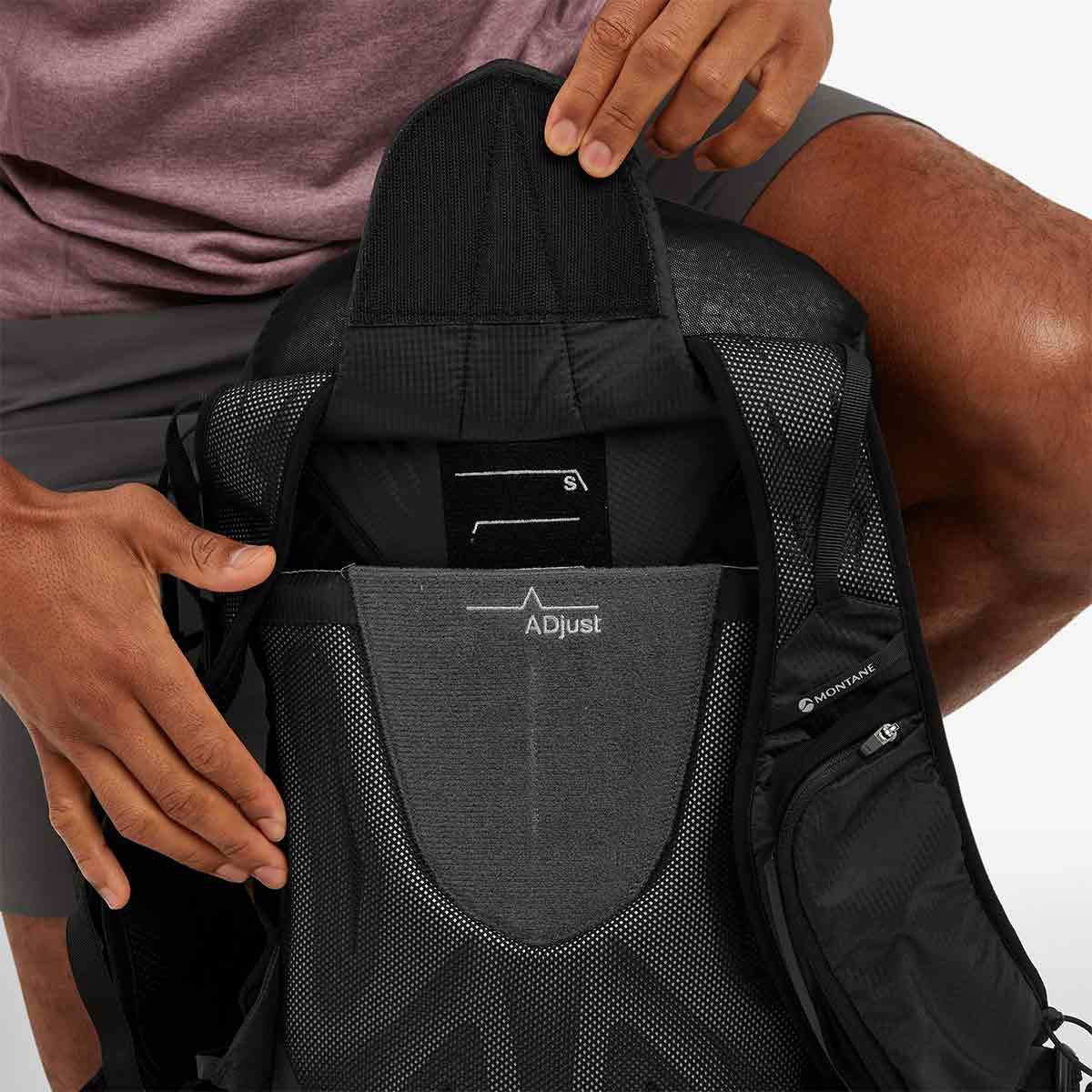 Interior view of the Montane Trailblazer 25L Rucksack, showing its adjustable back panel for a customized and comfortable fit.