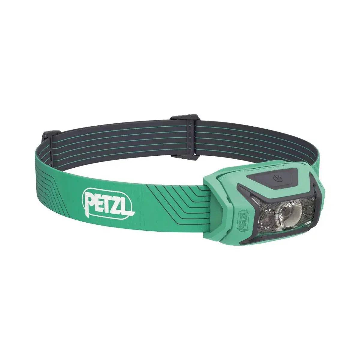 Petzl Actik Headtorch with Red Lighting 450 Lumens in green color, featuring a comfortable headband and powerful lighting for outdoor recreation.