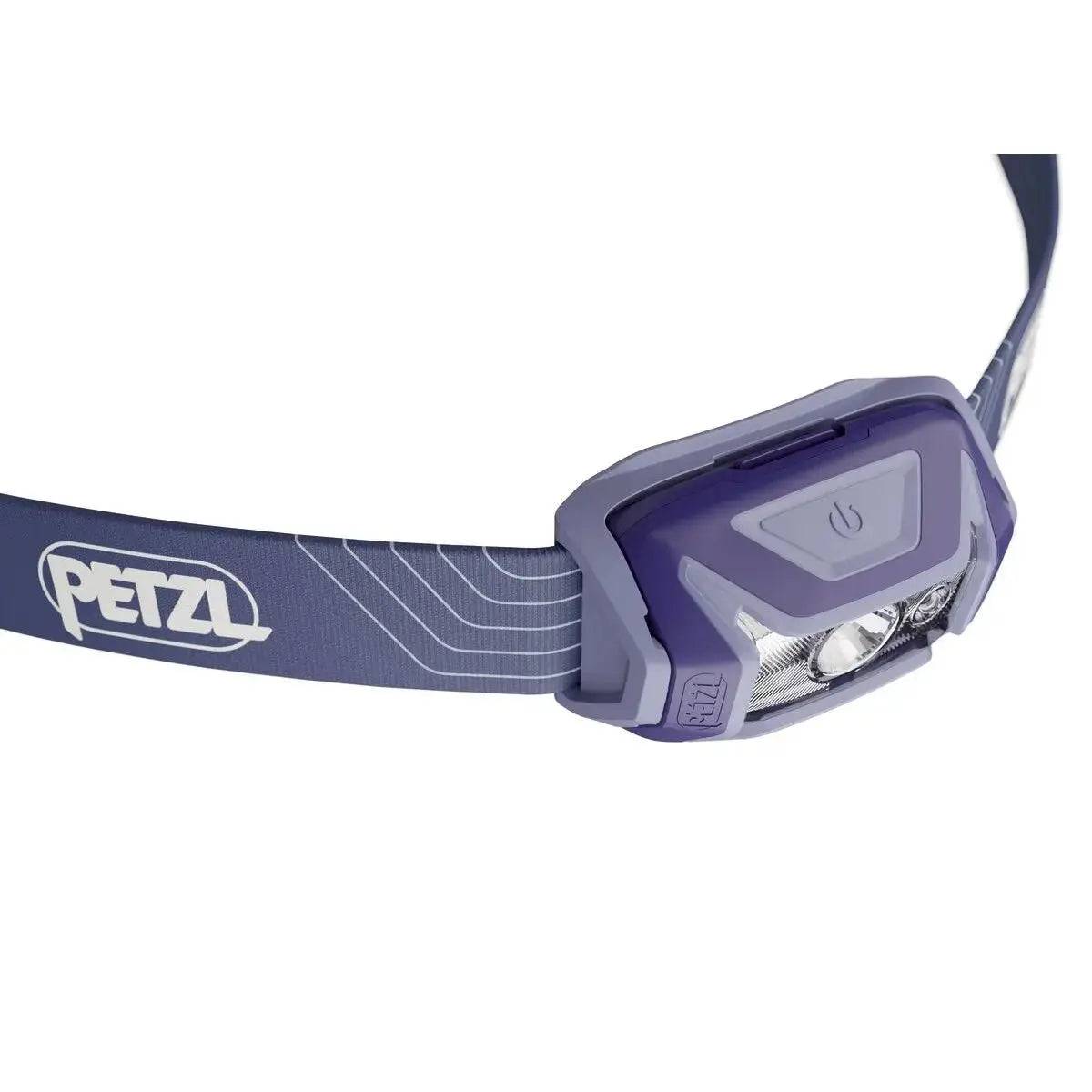 Side view of Petzl Tikka Head Torch with Red Light 350 Lumens in blue, highlighting the power button and ergonomic design.