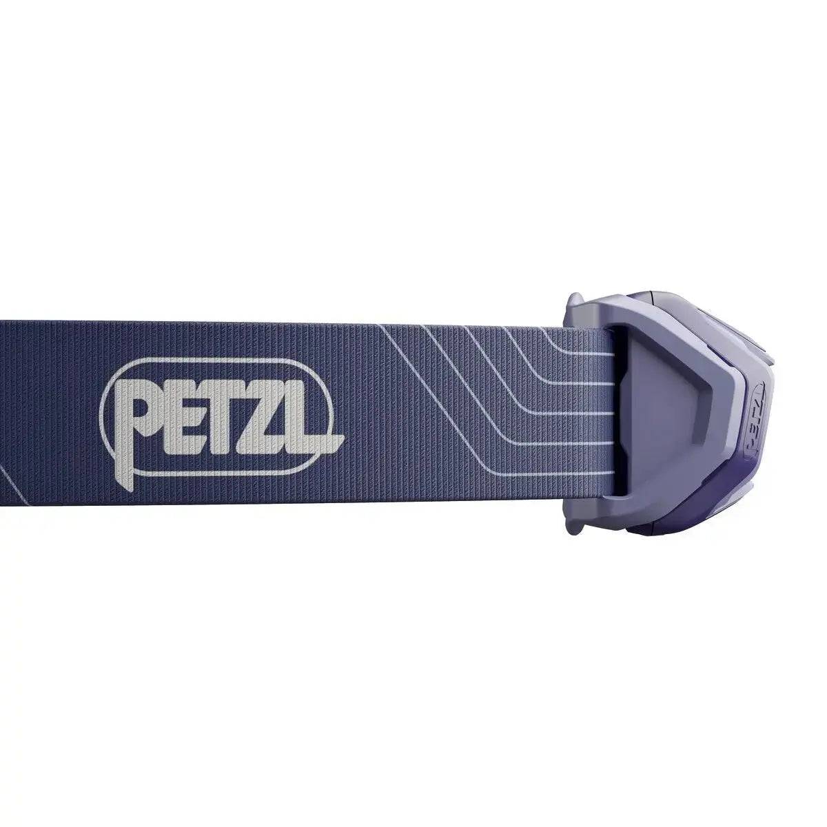 Detailed view of the Petzl Tikka Head Torch strap with PETZL branding, showcasing durable and adjustable headband construction.