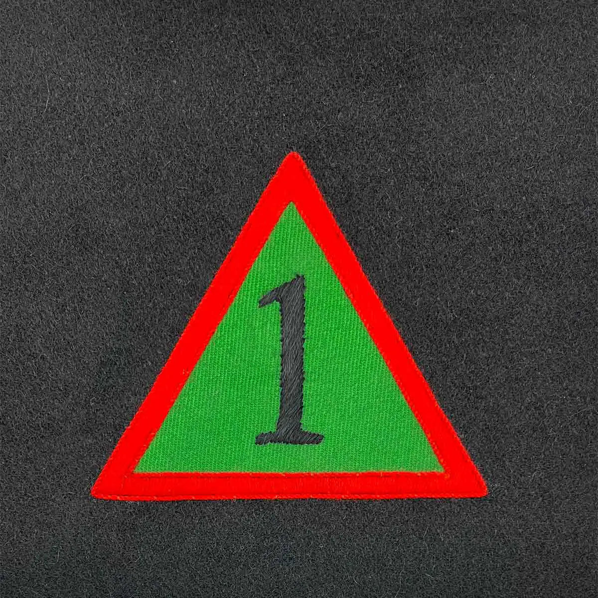 Triangular military insignia with a red border and green background featuring the number 1. Ideal for Army presentation frames and military memorabilia. 1 Armoured from John Bull Clothing