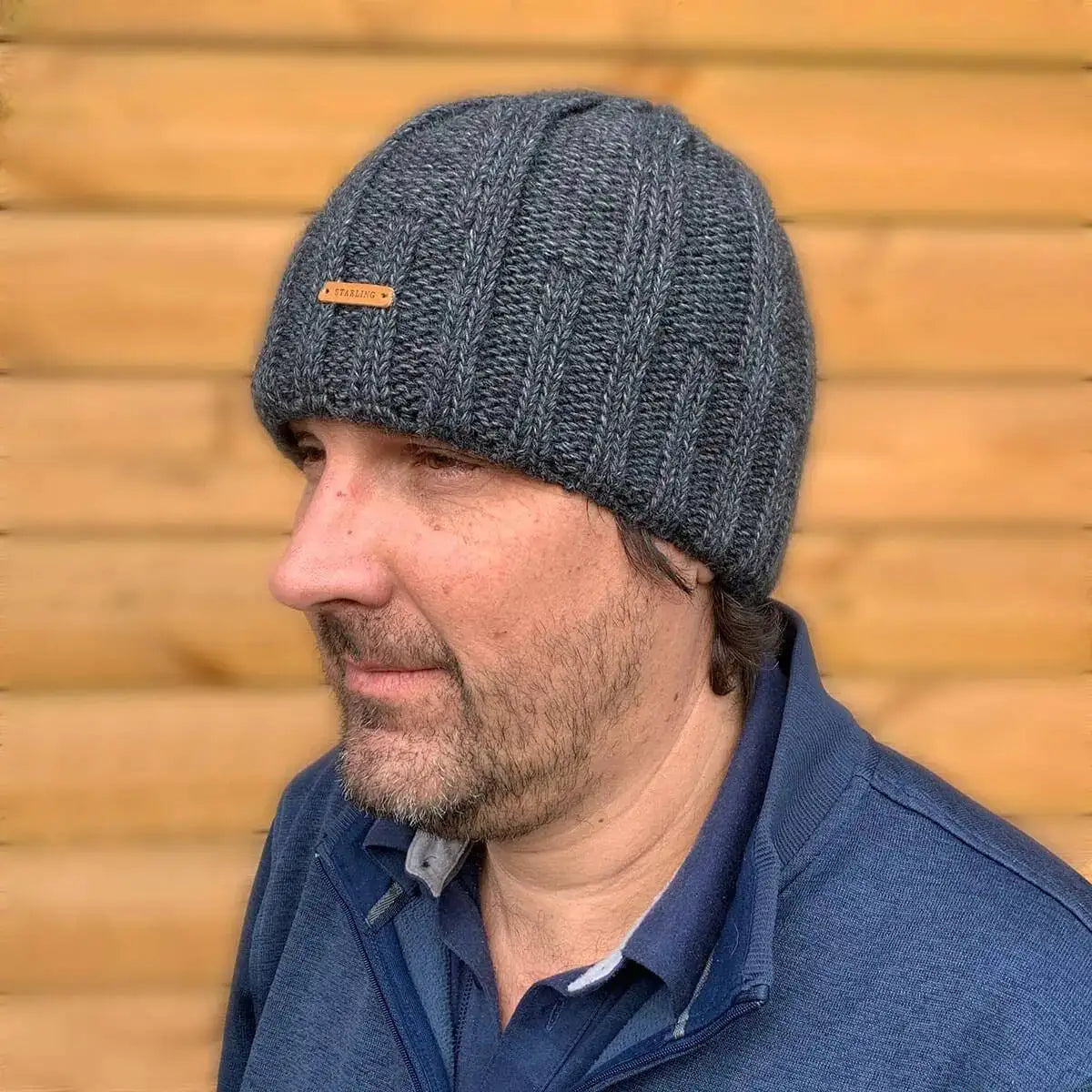 Man wearing Starling Unisex Pullover Beanie Hat 12032 in dark grey, ribbed knit wool design for winter warmth, available at John Bulls. from John Bull Clothing