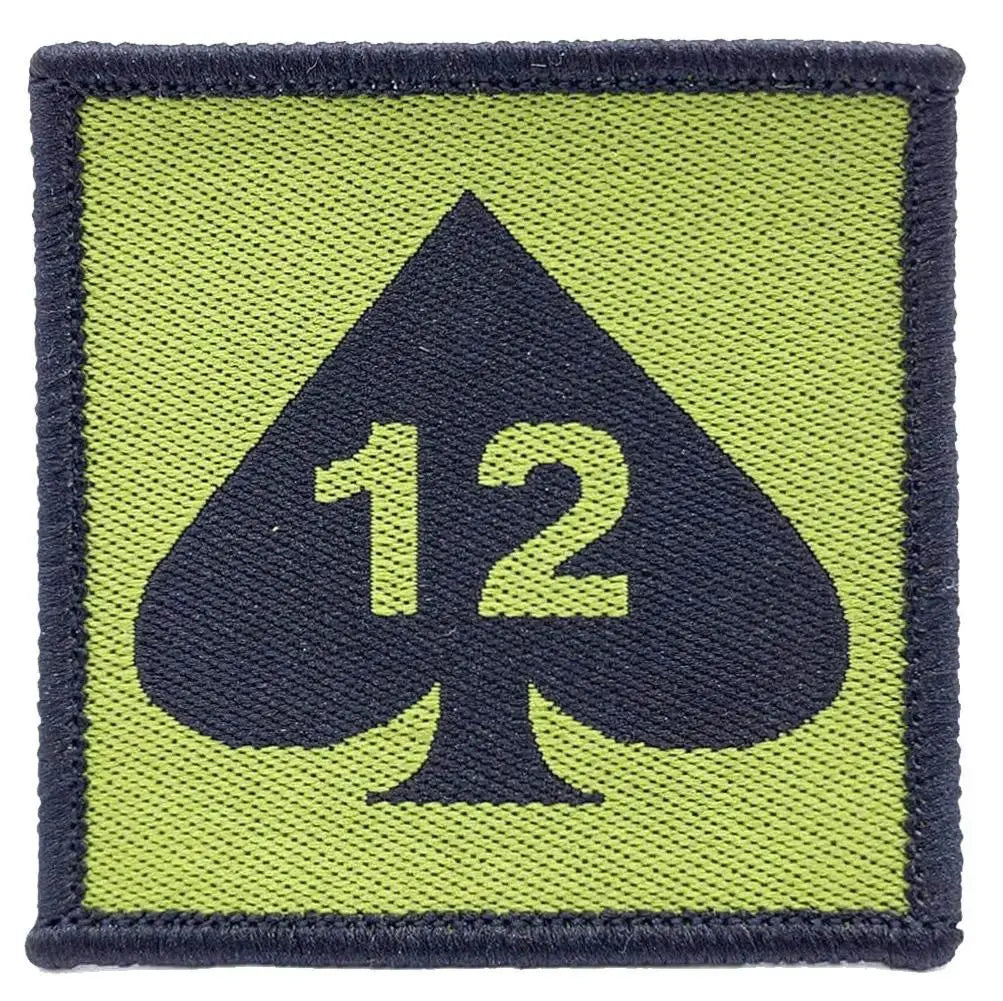 Close-up of 12 Armoured Infantry Brigade TRF patch with black spade and number 12, regulation military badge with hook & loop backing.
