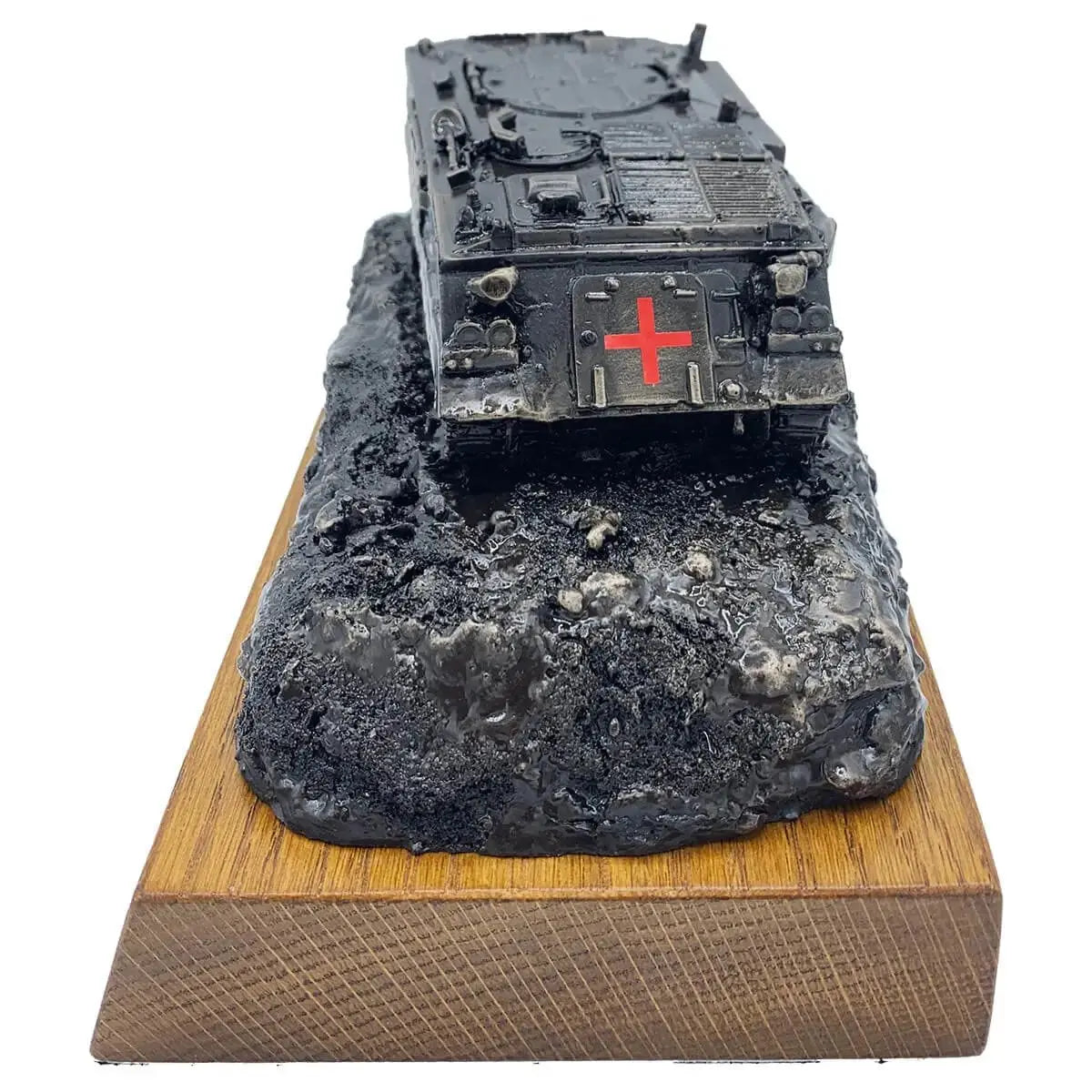 Front view of 432 Ambulance Personnel Carrier Bronze Statue with red cross emblem, mounted on textured terrain and wooden base.