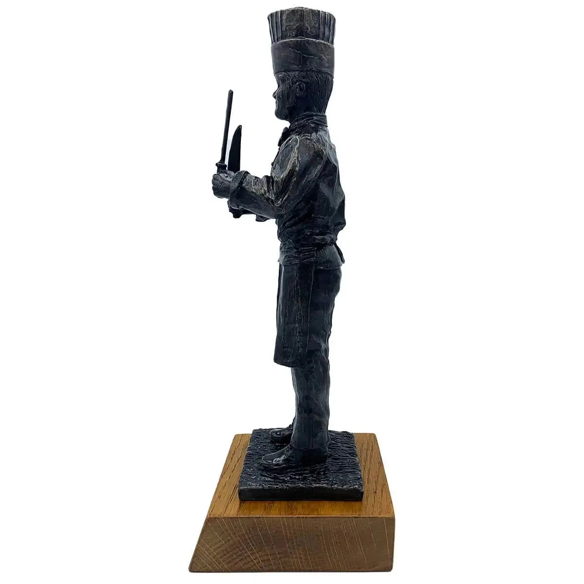 Side profile of Army Chef Statue Bronze Resin | John Bull Clothing showing detailed chef uniform and utensils, ideal for military-themed decor.