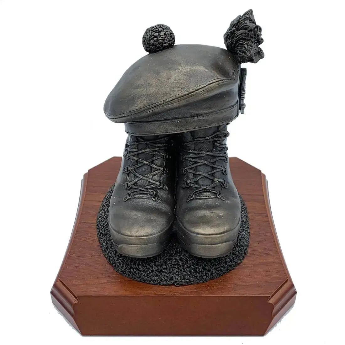 Boots and Tam O'Shanter Statue by John Bull Clothing featuring bronze resin military boots and Scottish cap on a wooden base. Ideal army tribute decor.