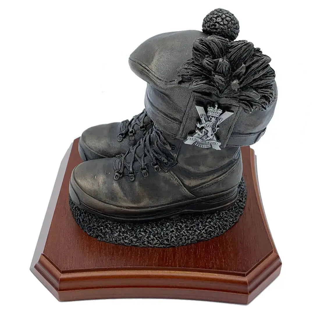 Side view of Boots and Tam O'Shanter Statue showing detailed bronze resin boots and traditional Scottish cap with regimental badge. Military sculpture decor.