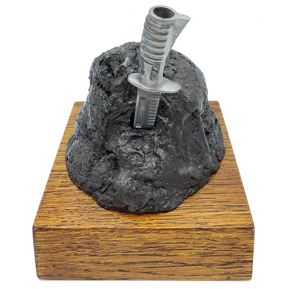 Bronze Resin Bayonet in the Rock Presentation by John Bulls, featuring a realistic bayonet embedded in textured rock on a solid oak base.