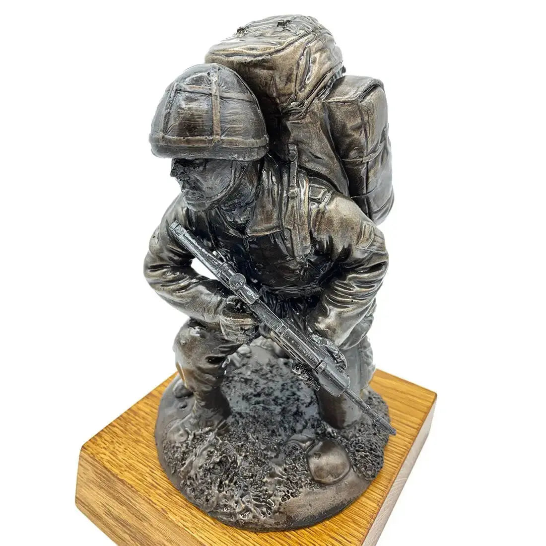 Angled view of Bronze Resin Kneeling Combat Statue with Helmet, depicting armed soldier in combat pose on oak base for home and garden sculpture.