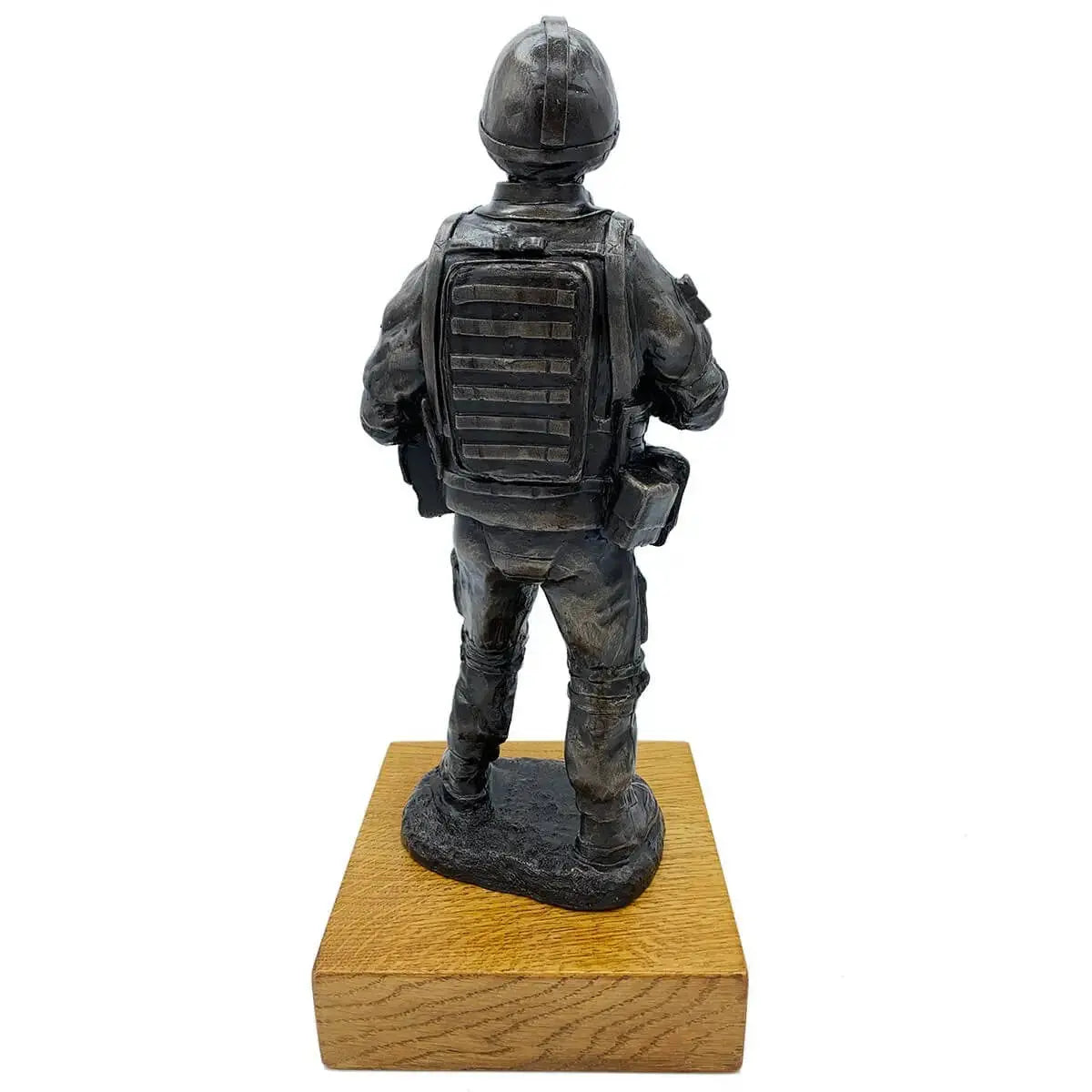 Rear view of British Standing Combat Patrol Bronze Statue highlighting backpack and body armor details, mounted on oak base.