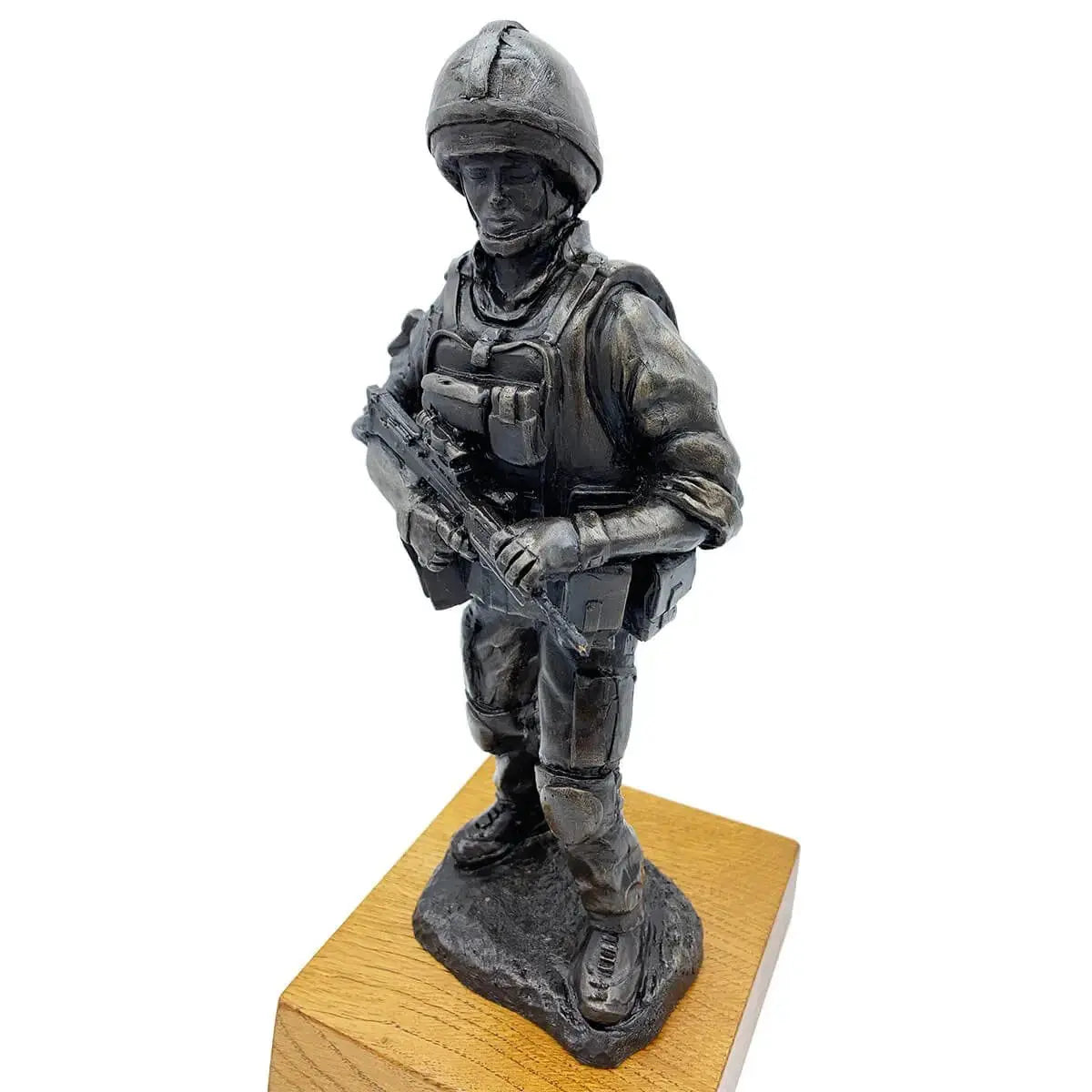 Angled view of British Standing Combat Patrol Bronze Statue showing soldier's alert stance and intricate gear details on oak base.