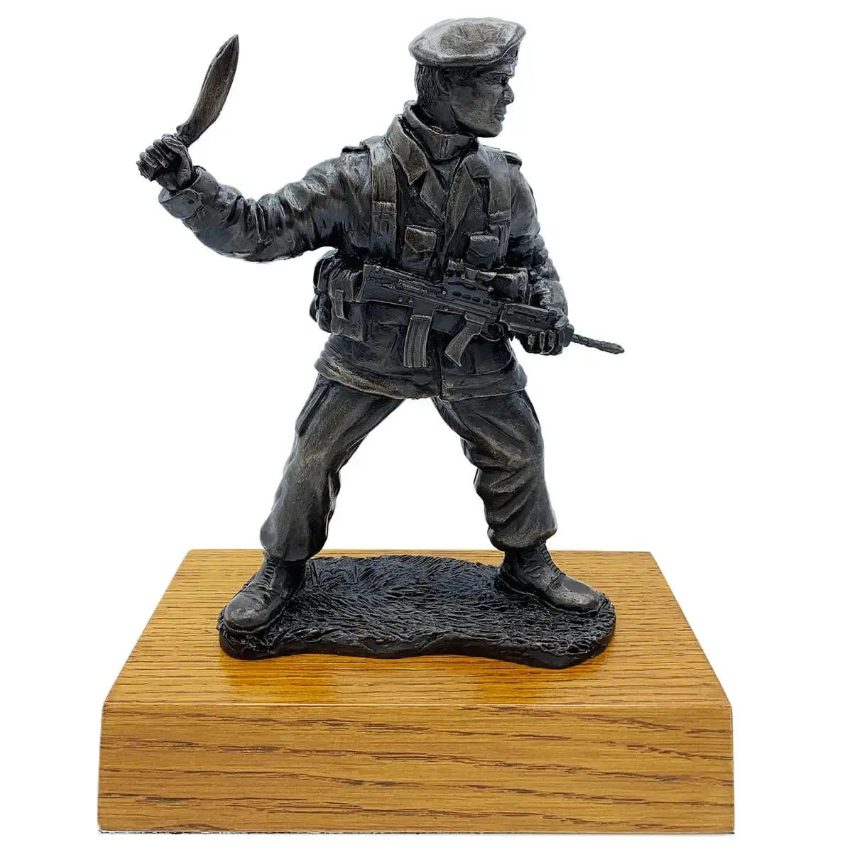Gurkha with Kukri bronze resin statue on wooden base, depicting a detailed soldier in combat stance holding a kukri and rifle. Ideal for military decor.