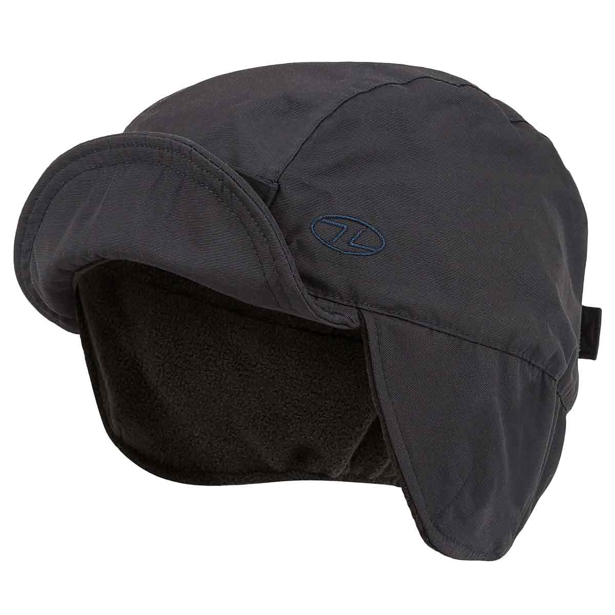 Side view of navy Highlander Dry Tech Mountain Waterproof Hat showing fleece interior and extended ear flaps for warmth.