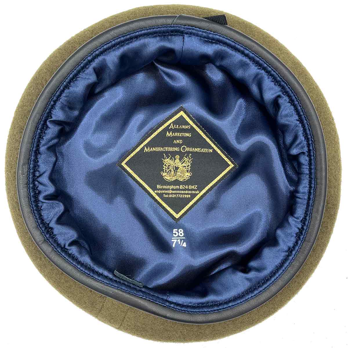 Interior of Khaki Army Beret Silk Lined from John Bull Clothing showing mid-blue silk lining and size label for premium comfort