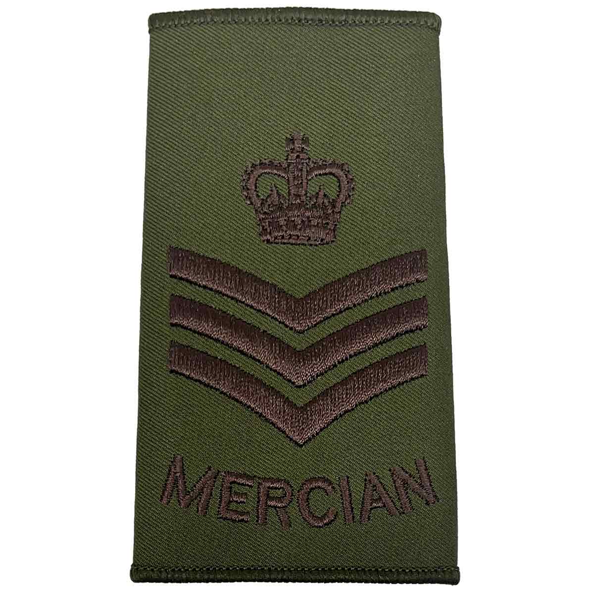 Olive green Mercian Regiment rank slide with crown and triple chevrons, indicating Staff Sergeant rank in military uniform apparel.