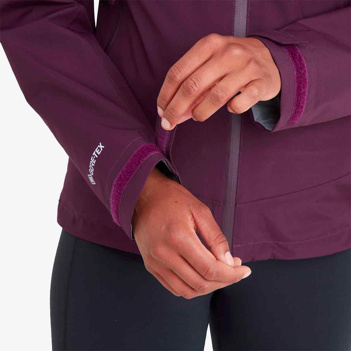 Close-up of Montane Womens Spirit Waterproof Jacket cuff adjustment. Velcro fastening ensures a secure and comfortable fit.