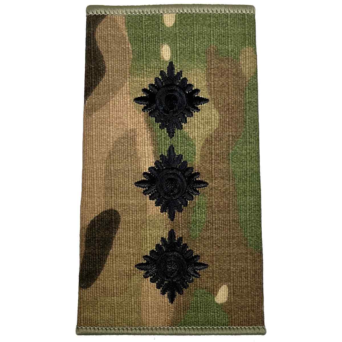 Three black pips on a Multicam Rank Slide, indicating senior officer rank, made from durable Cordura by John Bulls.