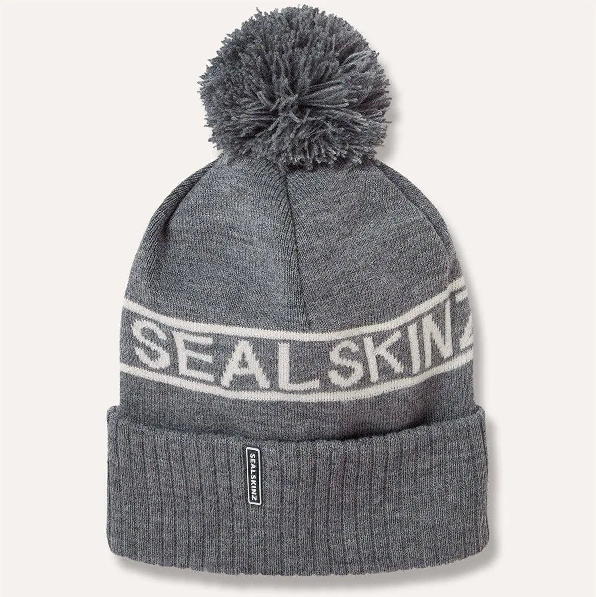 Grey Sealskinz Heacham Waterproof Cold Weather Icon Bobble Hat with white logo and pom-pom, perfect for cold, wet conditions.