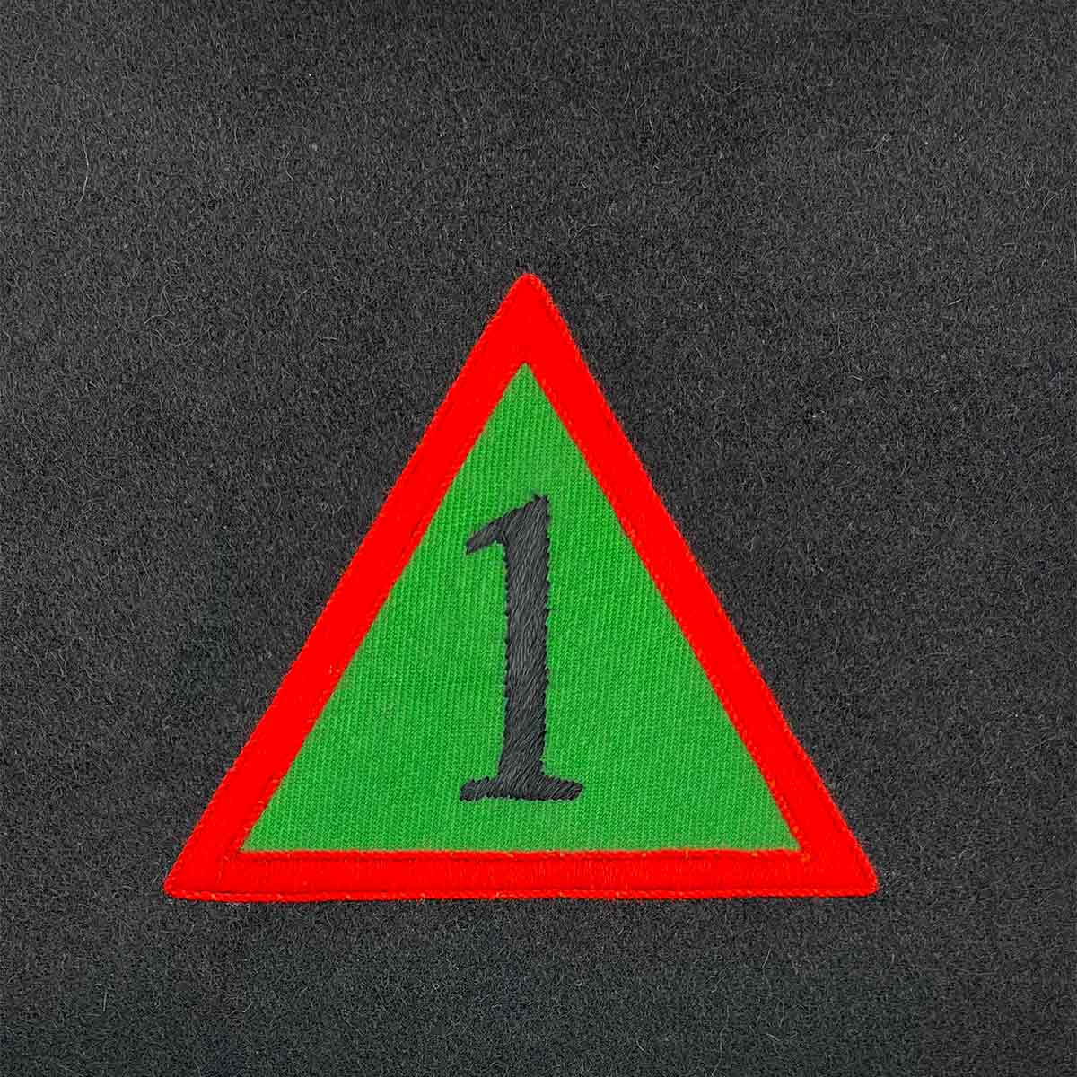 Triangular military insignia with a red border and green background featuring the number 1. Ideal for Army presentation frames and military memorabilia.