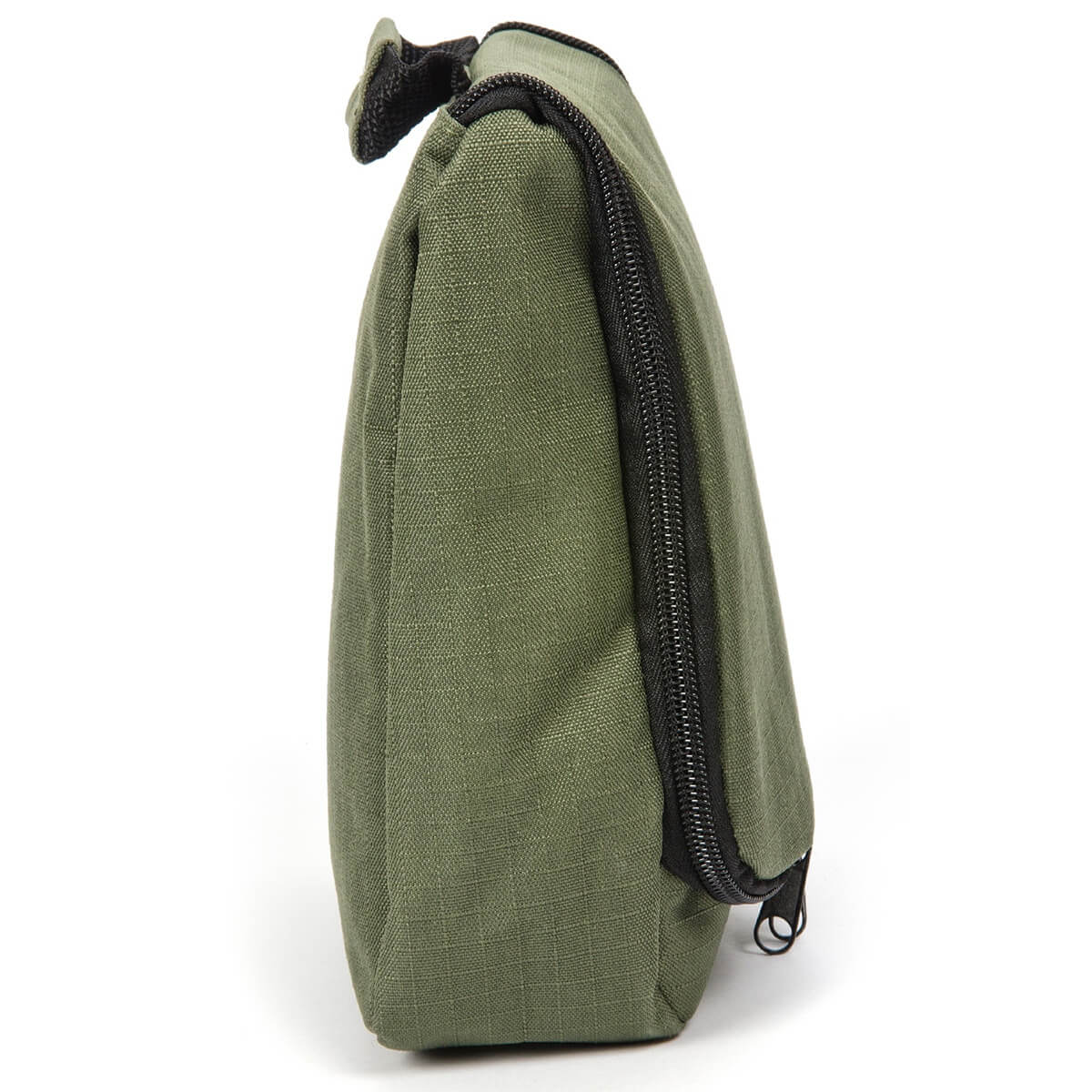 Side view of the Snugpak Essential Travel Wash Bag, showcasing its sturdy polyester material and zippered compartments for secure storage.