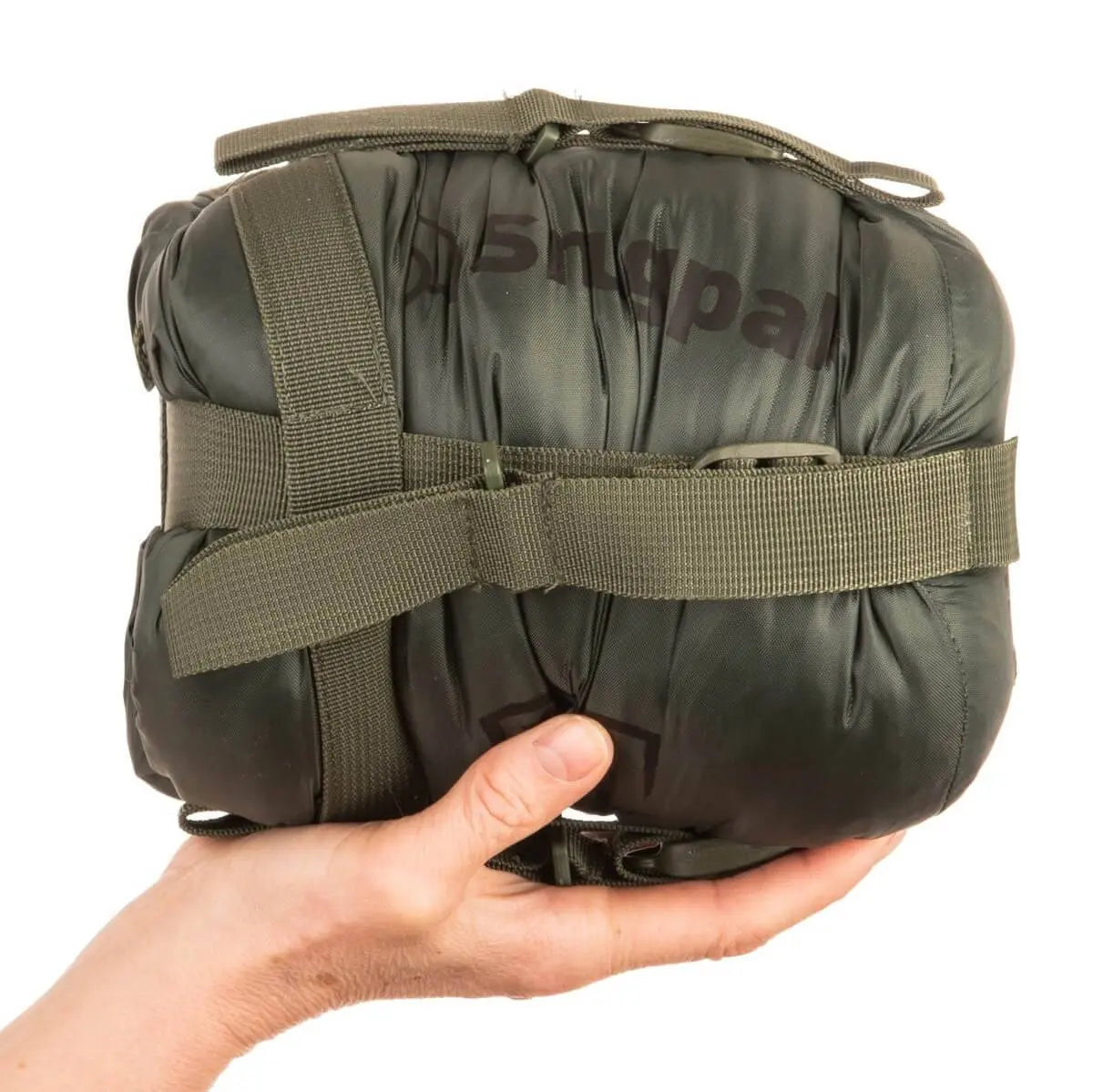 Compressed Snugpak Elite 1 Sleeping Bag Olive Green in stuff sack, compact and lightweight for easy transport on hiking trips.