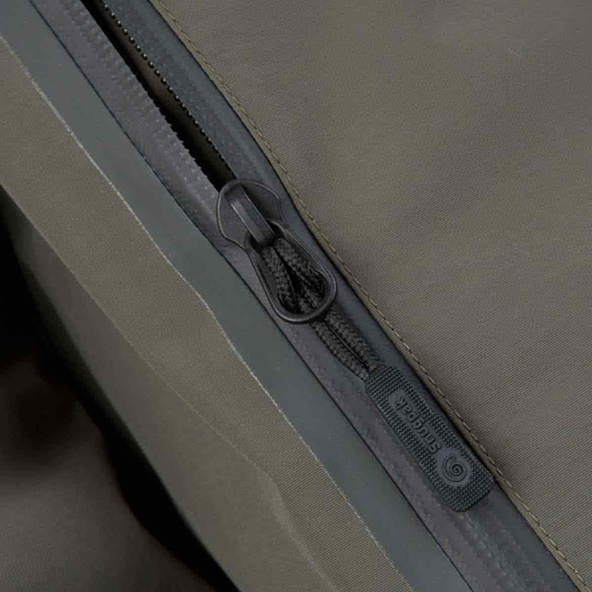 Snugpak Torrent waterproof zipper with branded pull tab, highlighting durable and weather-resistant construction.