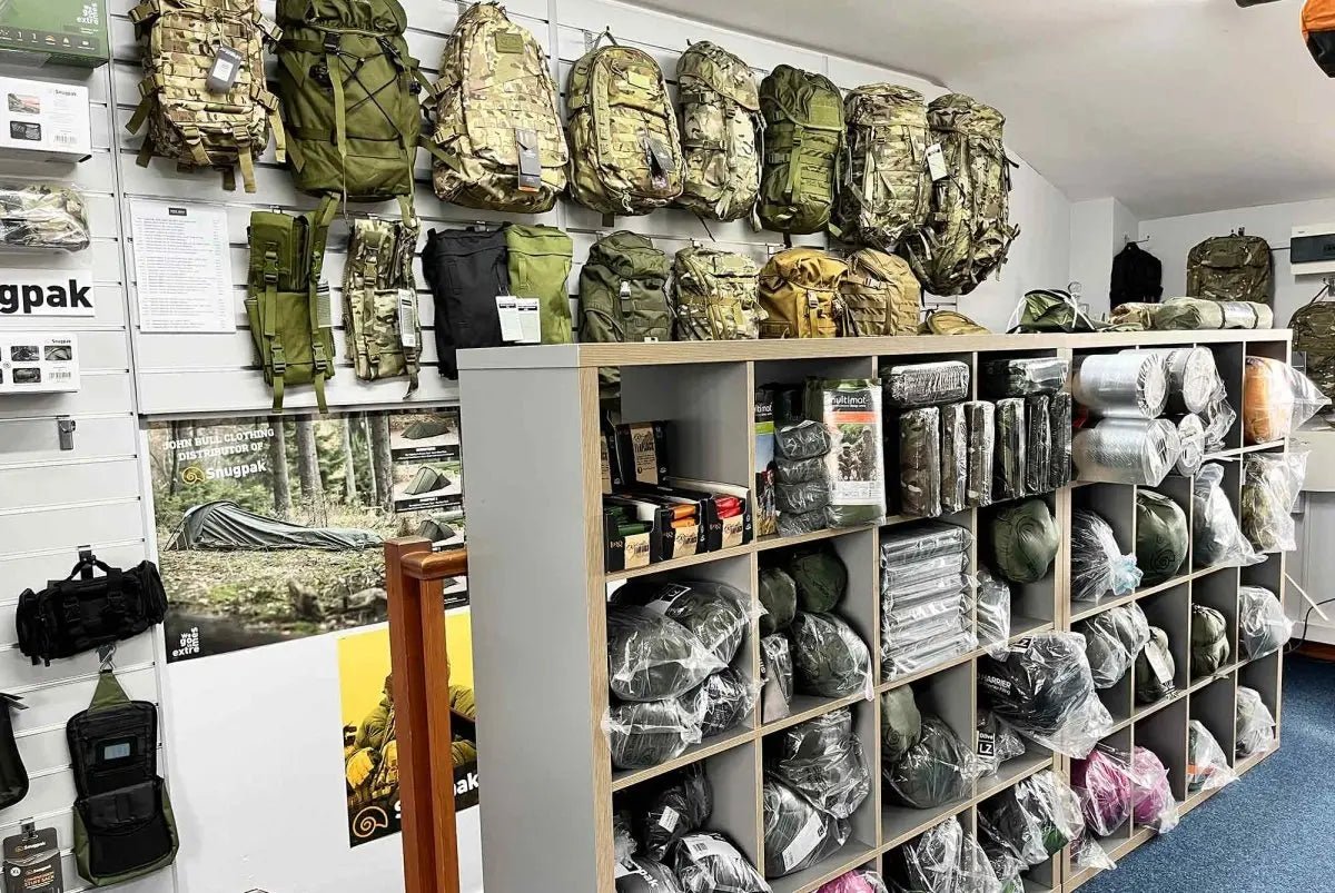 Tactical gear showroom with military backpacks and camping supplies.