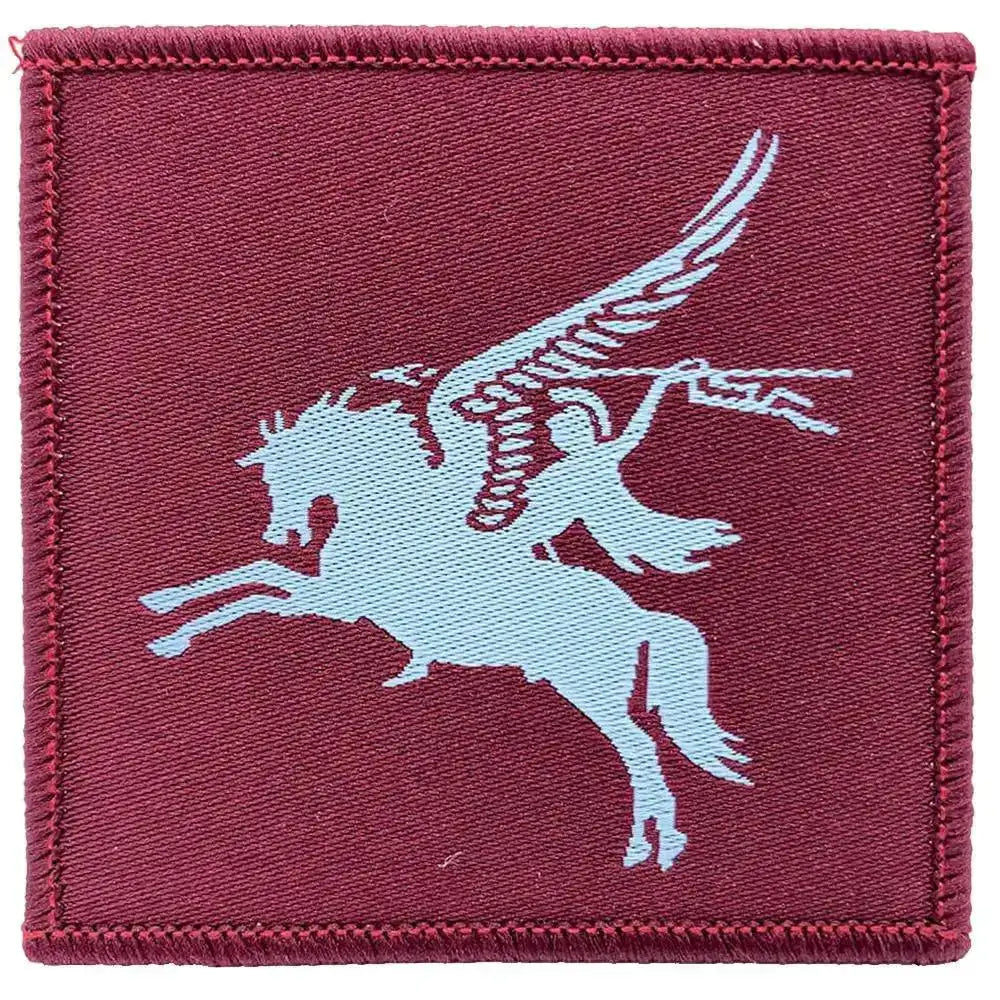 Single maroon 16 Air Assault Pegasus Brigade TRF patch with light blue Pegasus, regulation pattern for Parachute Regiment uniforms. Maroon (Coloured) from  John Bull Clothing 