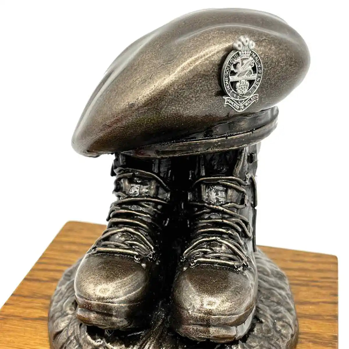 Bronze Beret and Boots Statue on Oak Base | John Bulls with regimental crest, customizable military tribute statue. Pewter Badge from  John Bull Clothing 