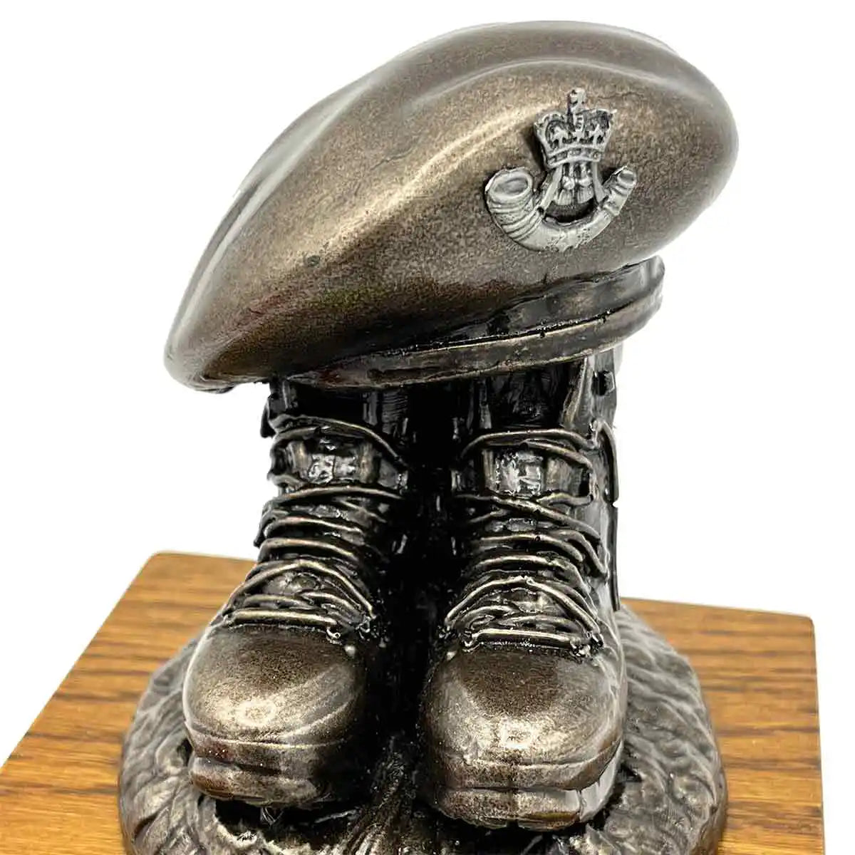 Beret and Boots Statue Bronze Resin on Oak Base | John Bulls with horn and crown badge, elegant army-themed home decor. Pewter Badge from  John Bull Clothing 