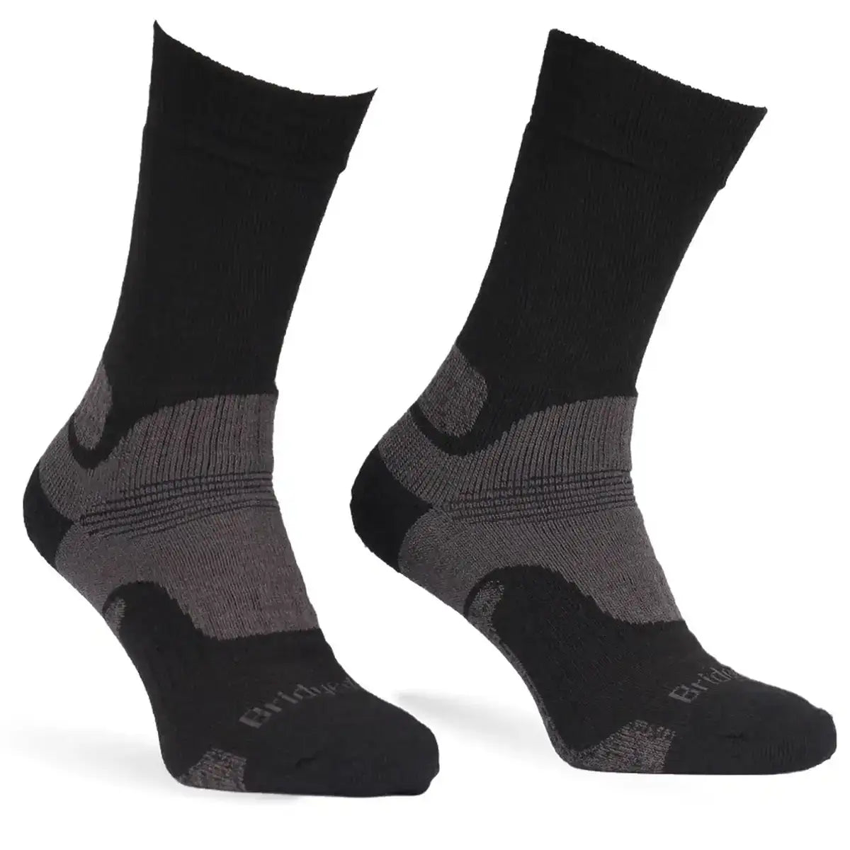 Black and gray Bridgedale Merino Mid-Weight Field Socks with reinforced heel and toe, suitable for rugged outdoor activities