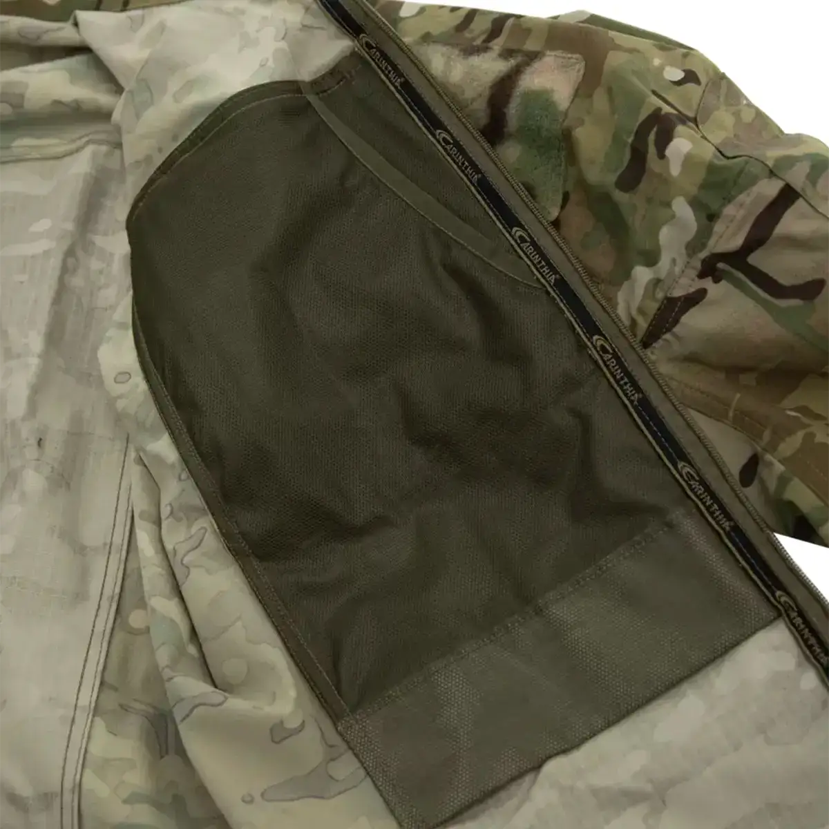Light-colored camouflage jacket with zippered chest pocket and Velcro patch  from  John Bull Clothing 