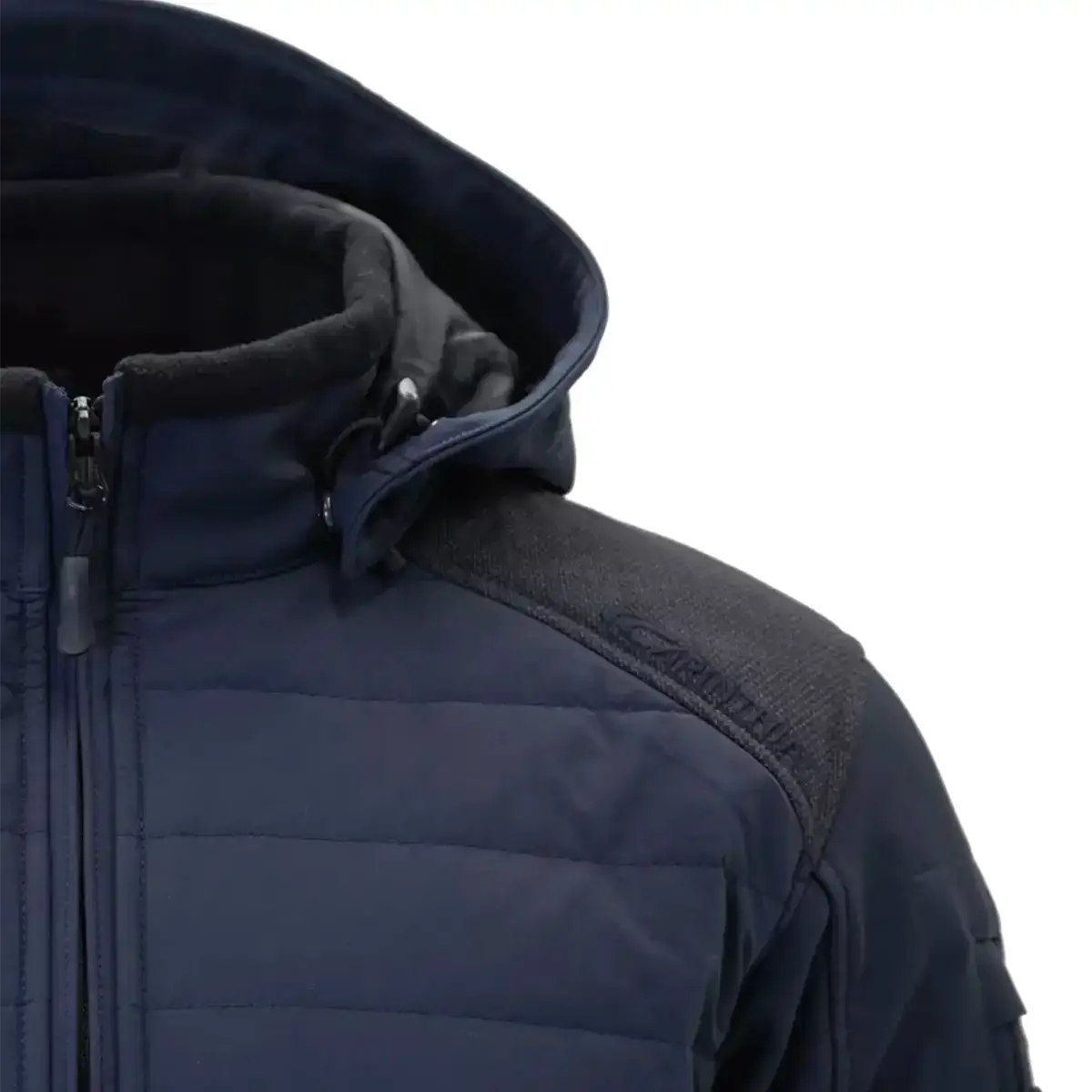 Close-up of the navy blue Carinthia G-Loft ISG PRO jacket's shoulder and collar, showing durable fabric and padded construction for warmth.  from  John Bull Clothing 