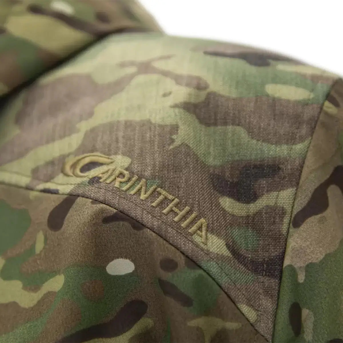 Carinthia branding embroidered on the shoulder of MIG 4.0 Jacket G-Loft Multicam, emphasizing premium craftsmanship and durability.  from  John Bull Clothing 