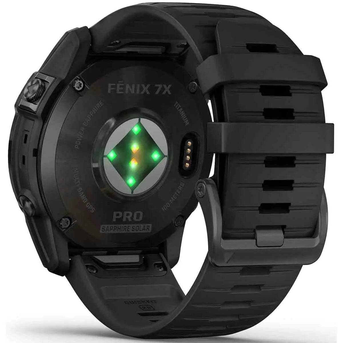Garmin Fenix 7X Pro Solar Carbon Grey Titanium smartwatch rear view, showcasing heart rate sensors and charging port.