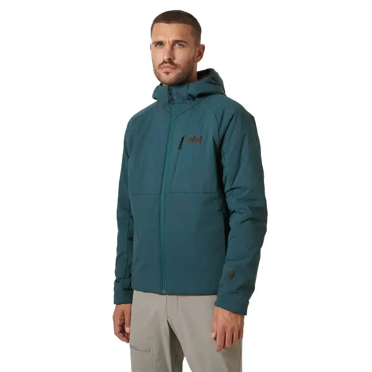 Model wearing the Helly Hansen Odin Stretch Hood Insulator 2.0 Jacket in teal, demonstrating its stylish fit, insulated hood, and functional outdoor design.  from  John Bull Clothing 