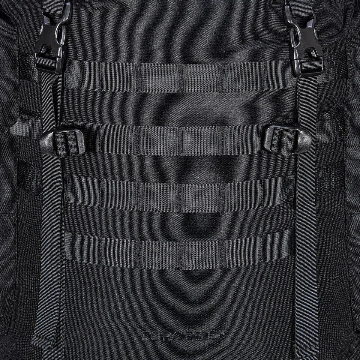 Detail of MOLLE webbing and buckle straps on Highlander Forces Elite 66 Litre Rucksack for attaching extra gear and accessories.  from  John Bull Clothing 