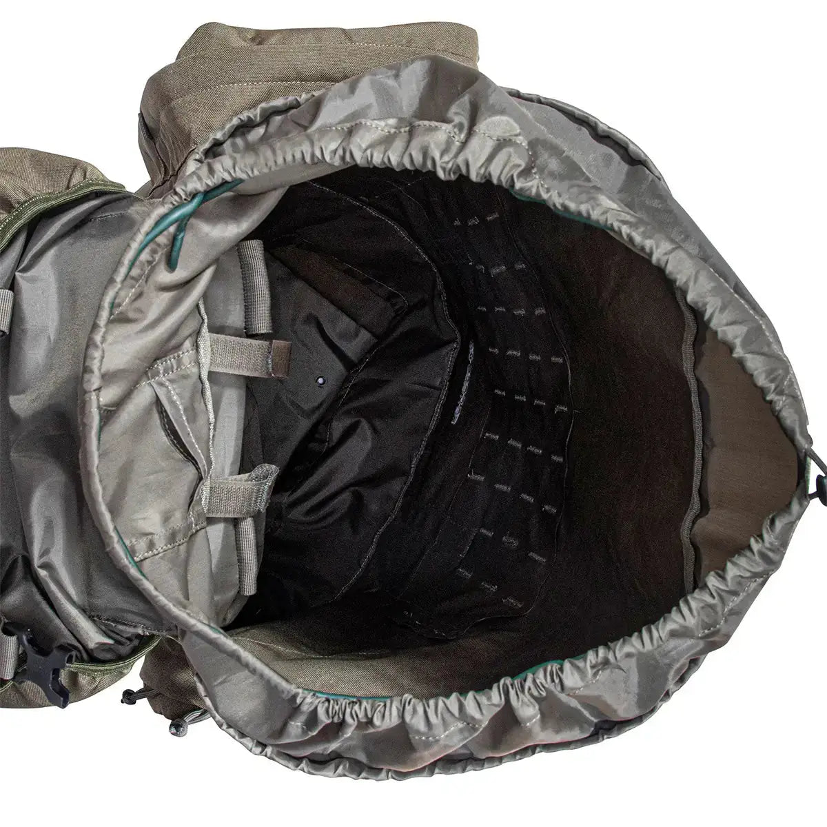 Interior view of Highlander Forces Elite 88L Bergen Pack showing spacious main compartment with drawstring closure and gear loops.  from  John Bull Clothing 