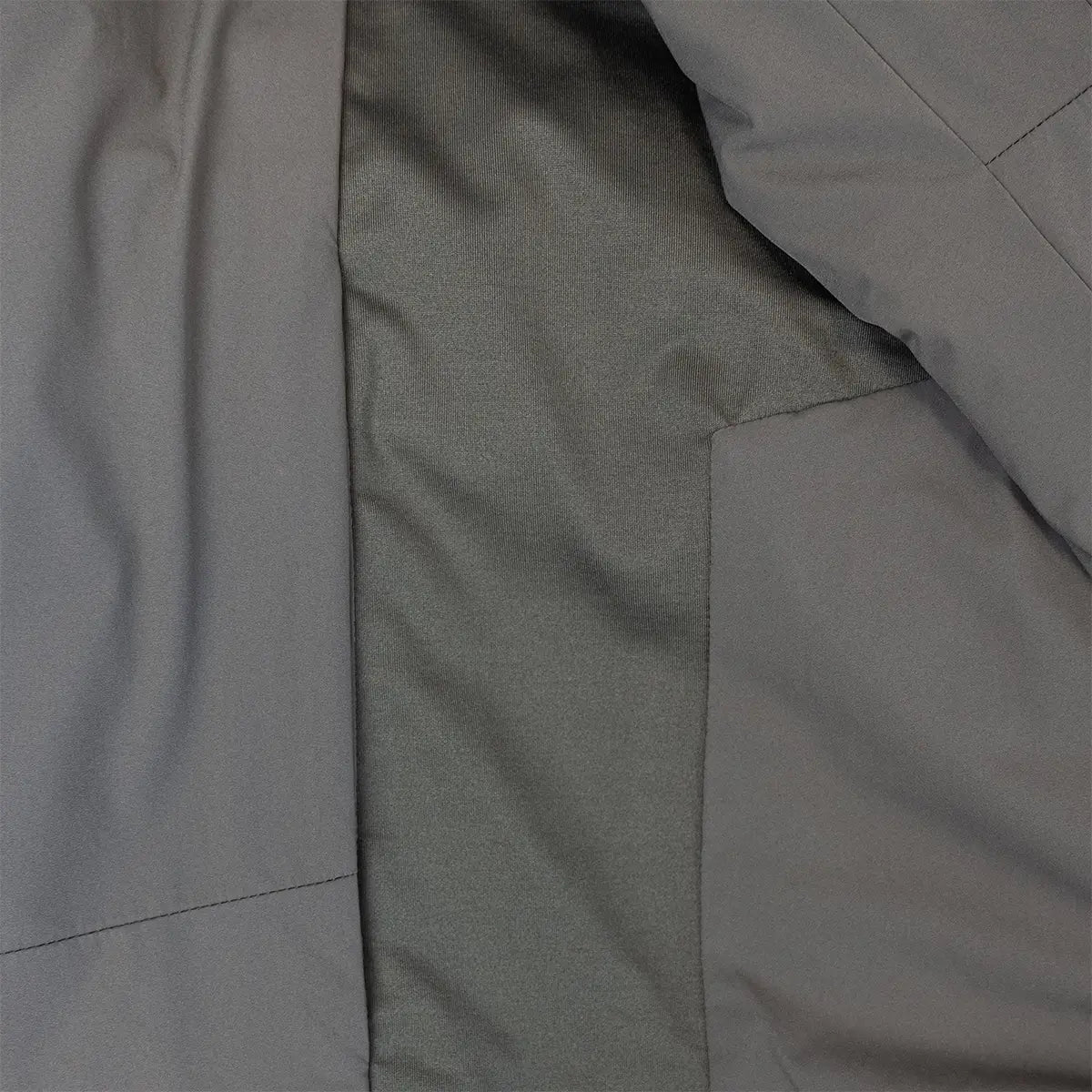 Detailed view of Highlander Stoirm Primaloft Jacket's inner lining and stitching, emphasizing insulation and comfort.
